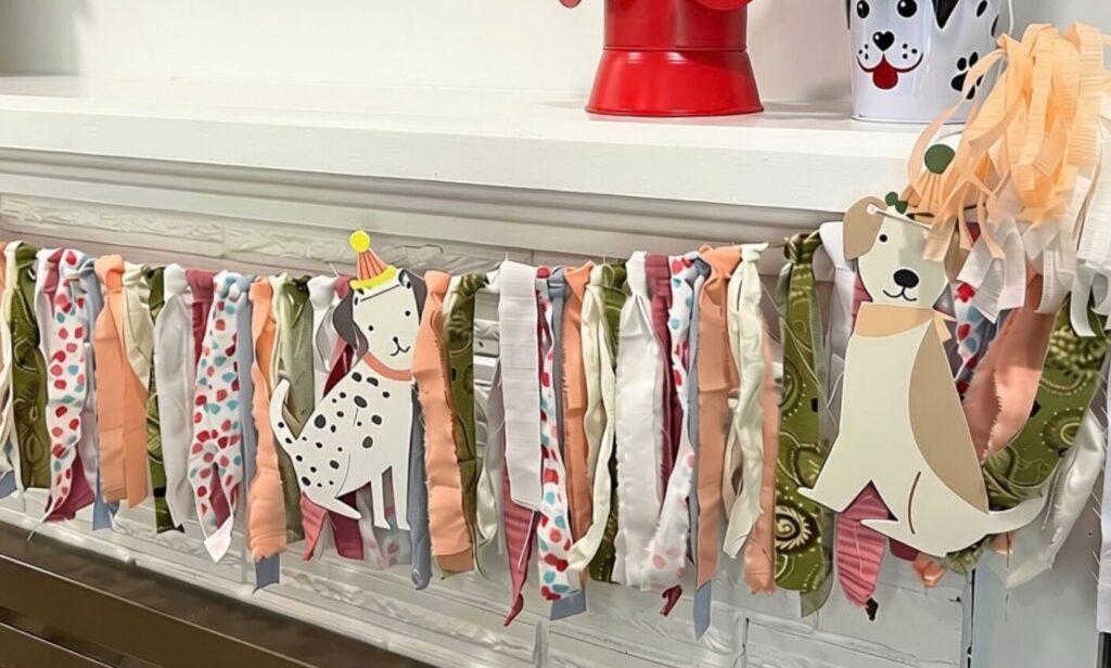Full and textured fabric garland outdoors with dog accents